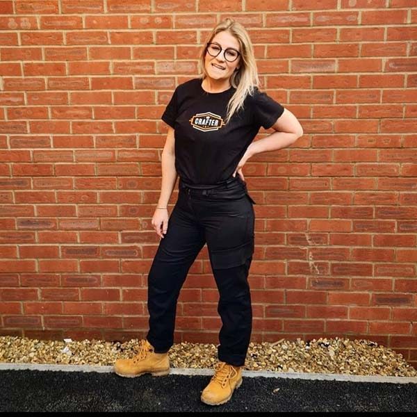 Lauren Holland showing her Crafter T-shirt and trousers